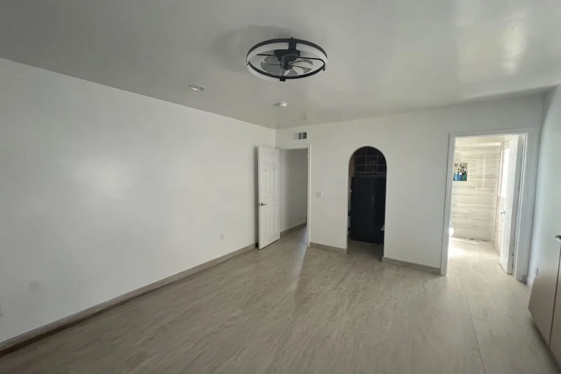 Open living area with walls and ceiling repainted, a Tony's Painting job in San Diego County
